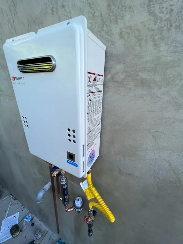 Tankless water heater installation for Shacktown homes